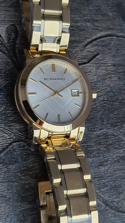Burberry Women’s White Dial Gold-tone 34mm – BU-9103 - twentyfour